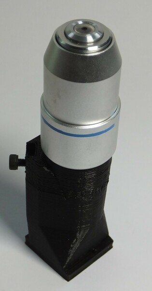 The objective, in place in the optics module